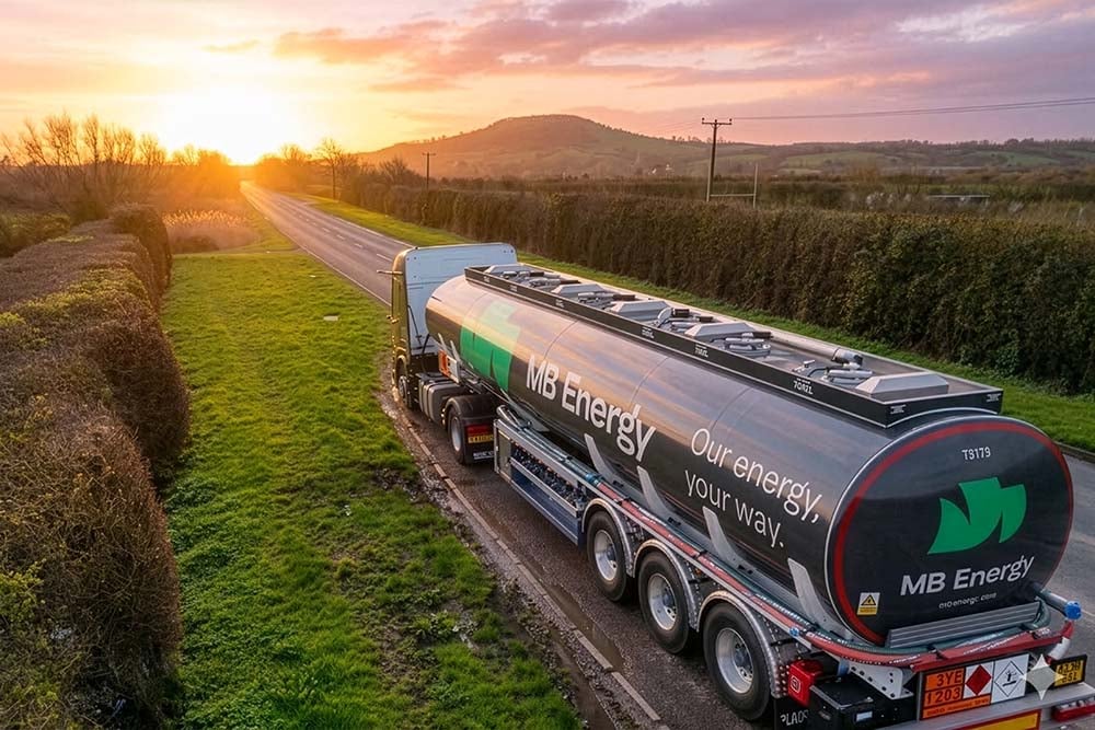 MB Energy fuel tanker parked on country road at sunrise