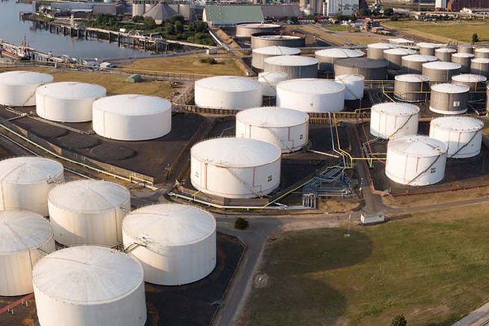 Fuel storage facility showing organized fuel tanks and pipelines.