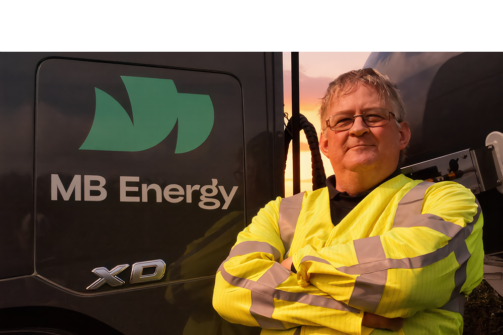 MB Energy delivery driver beside commercial AdBlue supply truck