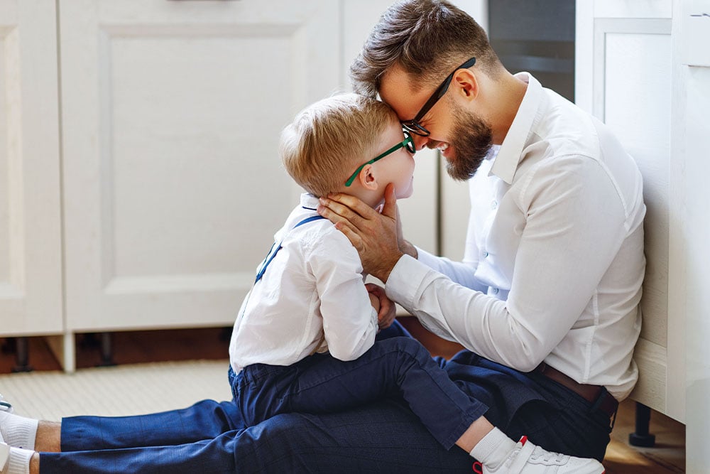 Father and son in an apartment building household with focus on dependable heating and comfort 