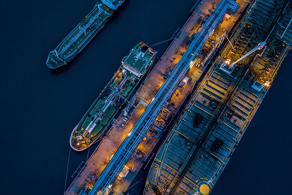 Bunkering vessel in port during marine fuel supply for commercial shipping operations 